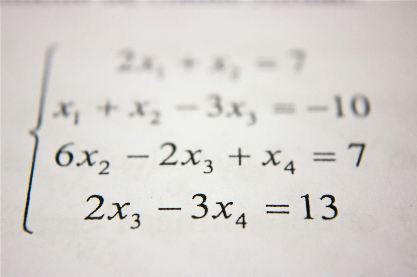 A system of linear equations written on paper