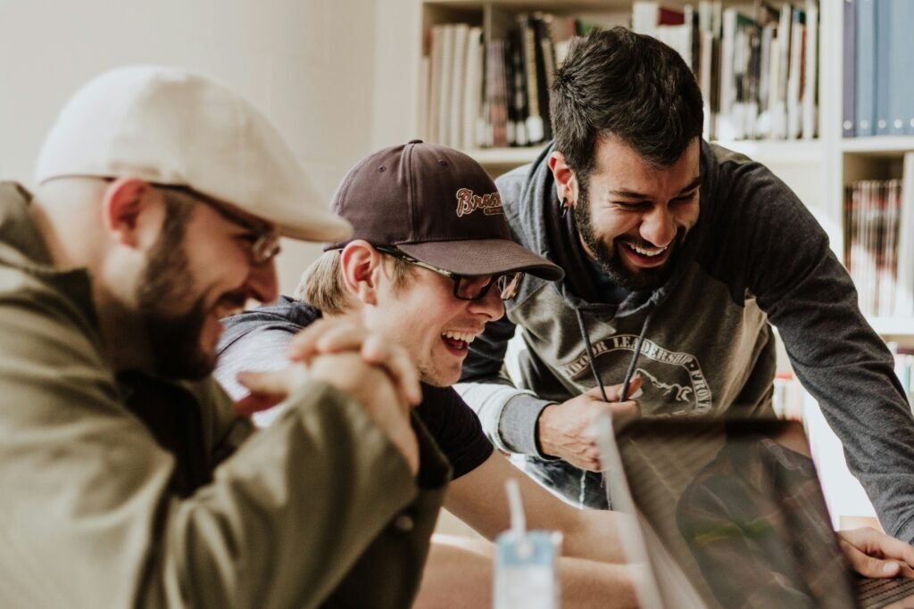 Men Studying And Laughing